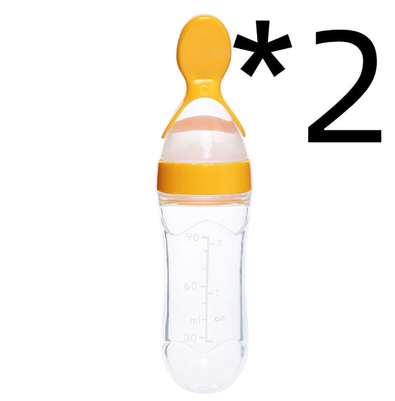 Baby Bottle Feeder With Spoon On Top